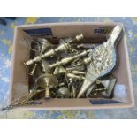 A box of assorted brassware.