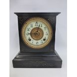 A slate mantel clock inscribed Ansonia Clock Co. New York.