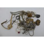 An assortment of costume jewellery including silver.