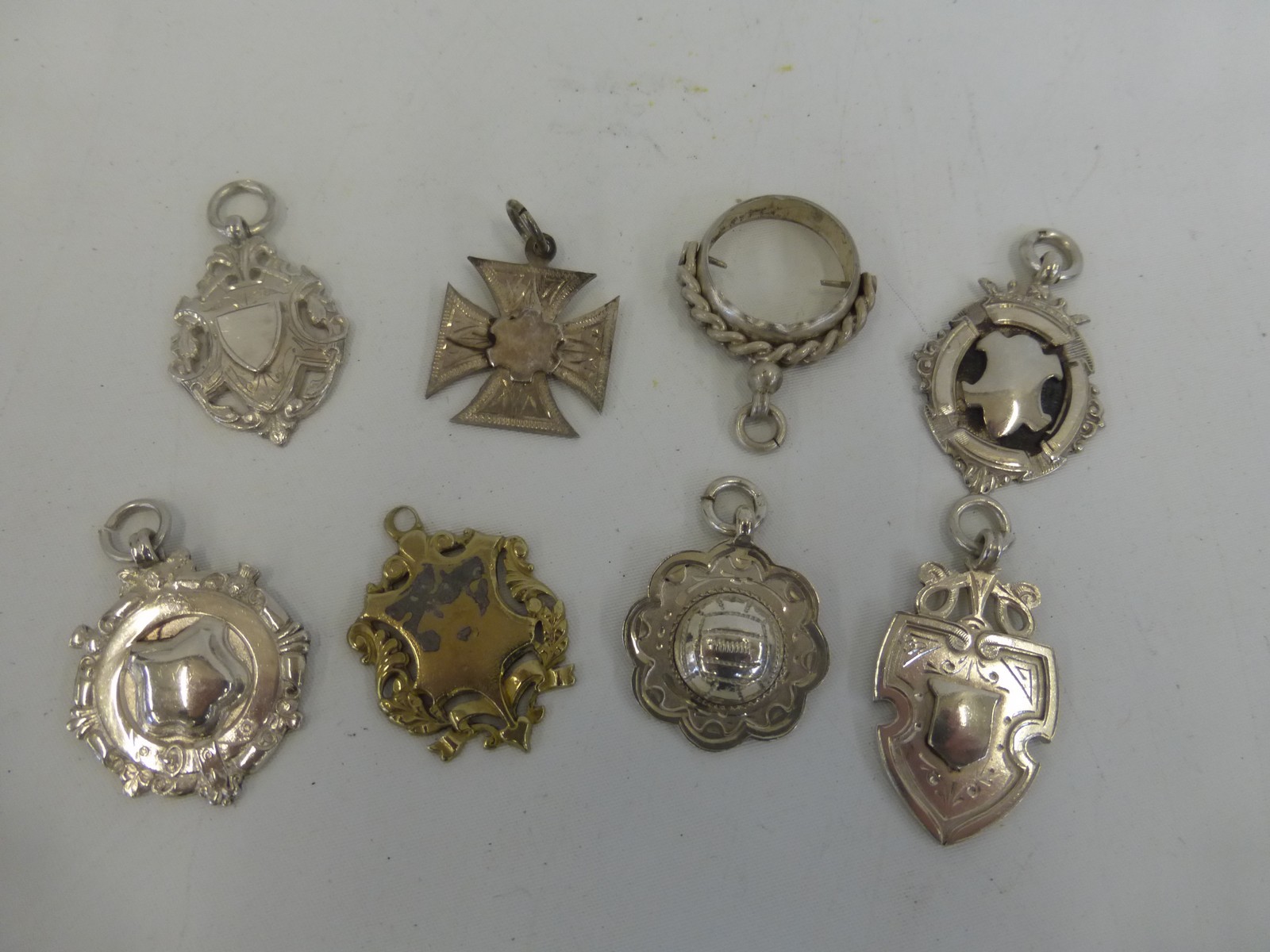 An assortment of 1920s silver football medals, three relating to Chippenham.