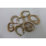 Five pairs of assorted 9ct gold hooped earrings, total weight 10.7g.
