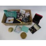 A box of assorted lady's costume jewellery, compacts, watches etc.