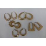 Five pairs of assorted 9ct gold hooped earrings, total weight 12.4g.