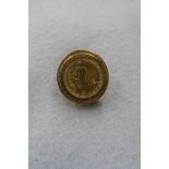 A tenth ounce gold krugerrand dated 1986, set in a 9ct gold mounted ring.