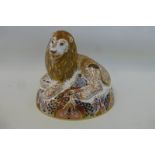 A 1996 Royal Crown Derby lion designed by Hugh Gibson 14.5cm high, silver stopper.