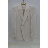 An ivory coloured pure silk gentleman's jacket by Durban for Harrods in clear carrier.