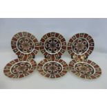 A set of six Royal Crown Derby Old Imari dinner plates all 1128 pattern, three LX, two LXI and one