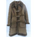 A Baily's Glastonbury lady's suede sheepskin coat, size 12.