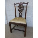 A 19th Century Chippendale style dining chair with drop-in seat, raised onsquare front supports to H