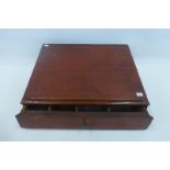 A 19th Century stained pine desktop ledger sloping writing box with single sectioned drawer (