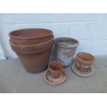 An assortment of terracotta plant pots.
