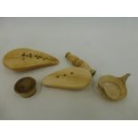 An assortment of 19th Century ivory including a small engraved bowl; also two halved whale's teeth