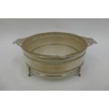 A silver glass lined butter dish with pierced decoration, maker - E.S. Barnsley & Co. (Edward Souter