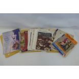 An assortment of early 20th Century magazines including a quantity of 1920s sewing /dress making