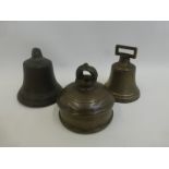 Three assorted brass bells of various ages.