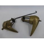 Two cast brass whale grease oil lamps, one with elongated hook.