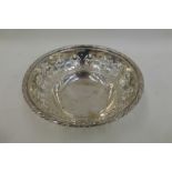 A silver bowl with pierced decoration and inscription to the well, maker S.G. & Co. Birmingham