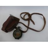 A leather cased military compass inscribed Barkers, Patents 29677/10, 14083/13, 110002/10.