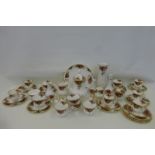 A collection of Royal Albert Old Country Roses pattern including a tea/coffee/sandwich set, shoes,