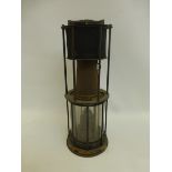 A late 19th Century/ early 20th Century hand held Oelbrenner safety miner's lamp with hinged