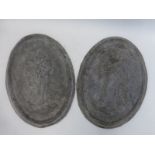 A pair of 19th Century oval lead country house gate pillar plaques, both depicting classically