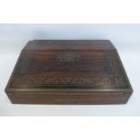 A good Regency rosewood and brass inlaid writing slope.