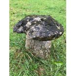 A large period stone staddle stone with top.