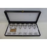 A cased set of six Italian wine glasses.