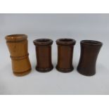 Four 19th Century treen dice shakers.