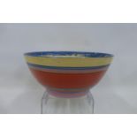 A large Clarice Cliff Newport Pottery Bizarre Liberty's bowl (hairline chip to base and surface