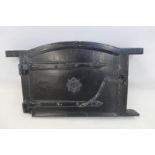 An 18th Century/ 19th Century cast metal bread oven door.