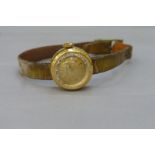 A cased lady's 18ct gold Movado wristwatch with original recipt and guarantee dated 1959 (import
