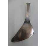 An unusual silver food slice with textured handle, London 1985.