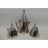 A three piece Art Deco style polished steel Batchelor tea set comprising teapot, sugar bowl and milk
