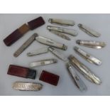 Fourteen assorted silver and mostly mother of pearl handled pocket/fruit knives including a knife
