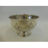 A silver pedestal bowl with all-over decoration and an inscription "From a grateful wartime lodger",
