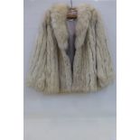 A Marcel Creation saga fox lined fur jacket, size 12.