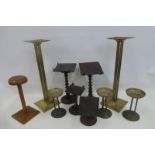 Nine assorted wooden and metal shop display stands.