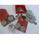 An assortment of English coinage including some silver.