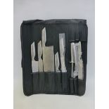 A cased Antony Worrall Thompson eight piece chef's knife set.
