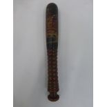 A 19th Century turned truncheon of small proportions with original paintwork decorated with a