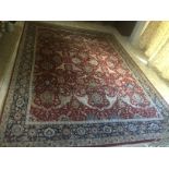 A large and good quality floral carpet of red and blue design, 107 1/2 x 147".