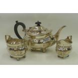 A three piece silver tea set comprising a teapot, a milk jug and a sugar bowl, maker - Mappin &
