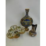 An 18th Century style moon flask and a Portuguese clover shaped pedestal bowl; also a pottery glazed
