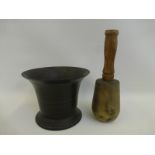 A 19th Century bronze mortar with a brass and wooden handled pestle of large proportions, mortar 6