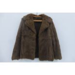 A British made fur jacket, size 10.