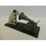 A cast metal HMV dog with gramophone.