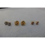 Three pairs of 9ct gold earrings, including sapphire and diamond, and ruby and diamond.
