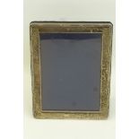 A rectangular silver photograph frame, London hallmark.
