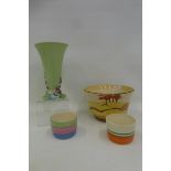 A Clarice Cliff Newport Pottery Bizarre Coral Firs bowl (cracked), a Clarice Cliff vase and two